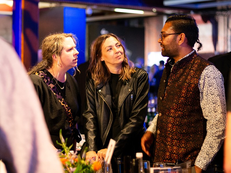 People conversing at the 2025 Greater Manchester Good Employment Awards